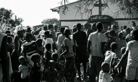 people standing in front of a church