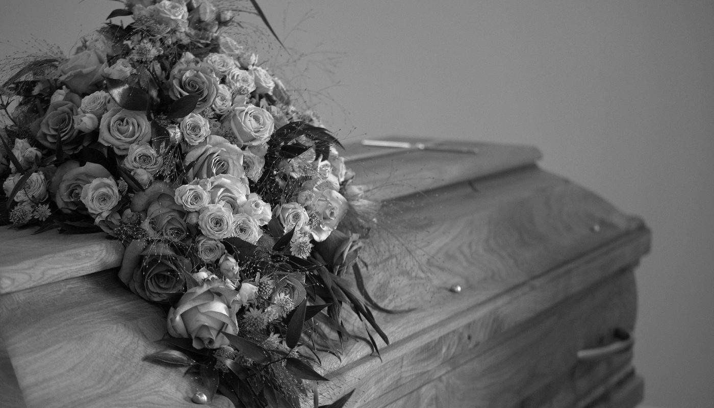 flowers decoration on wooden casket